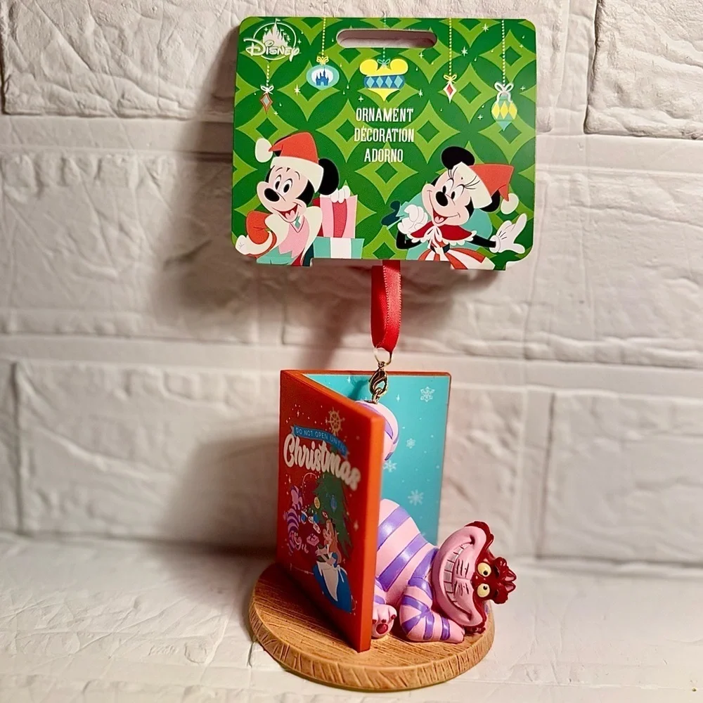 New Disney Cheshire Cat Christmas Ornament in Book Red and Purple